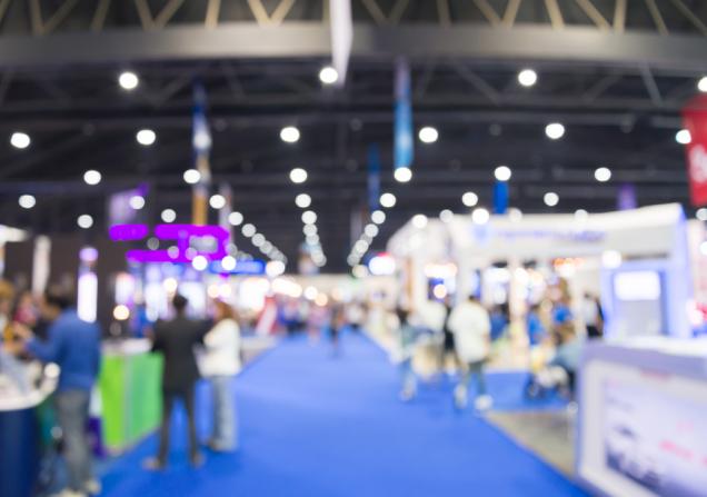 A blurred image of an exhibition hall. Image by Pla2na via Shutterstock