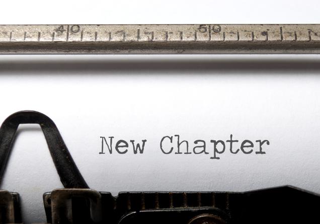 'New Chapter' written on a typewriter. Image by Pixelbliss via Shutterstock.
