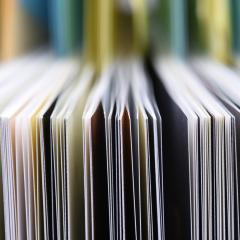 Edge-on view of the pages of some books or journals. Image by Flegere via Shutterstock.