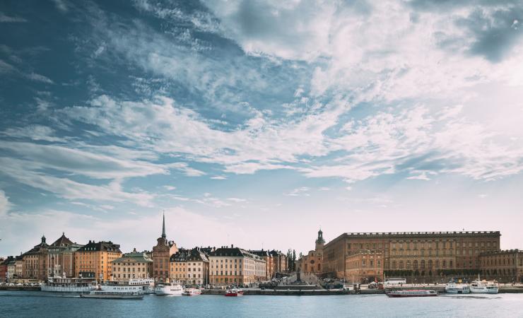 View of the Stockholm waterfront in the sunshine. Image by George Trumpeter via Shutterstock.