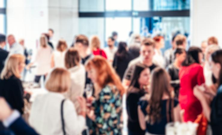 Blurred image of business people at coffee break at conference meeting.