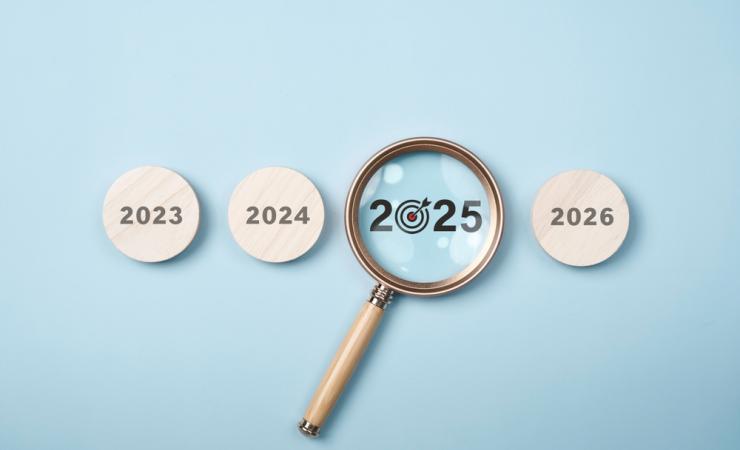 Magnifying glass on the letters 2025. 