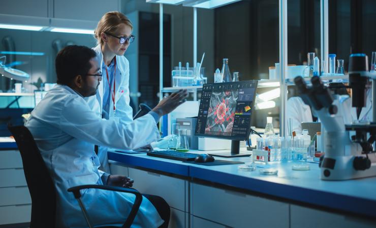 Researchers in lab working on vaccine development. Image credit: Gorodenkoff via Shutterstock