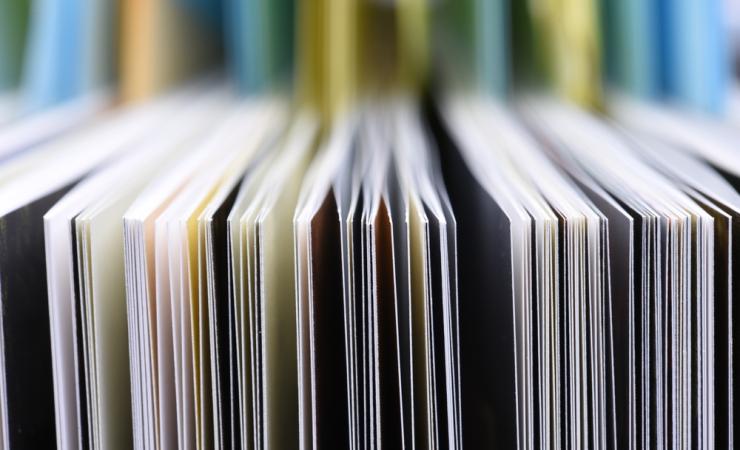 Edge-on view of the pages of some books or journals. Image by Flegere via Shutterstock.