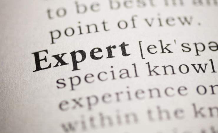 The word Expert in a dictionary. Image by Feng Yu via Shutterstock