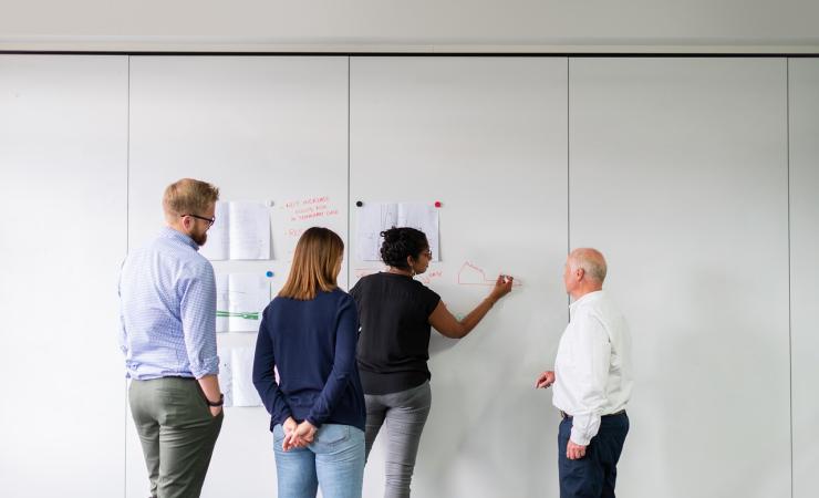 Image of students writing on whiteboard. Image courtesy of RAEng_Publications pixabay