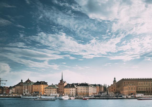 View of the Stockholm waterfront in the sunshine. Image by George Trumpeter via Shutterstock.