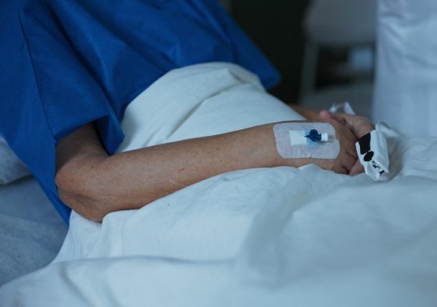 A patient in a bed, getting hospital care at home. © Trzykropy, Shutterstock