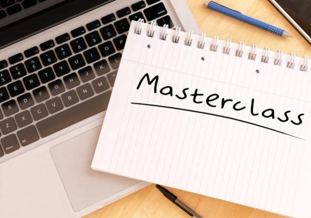 'Masterclass' written on a notepad on a laptop