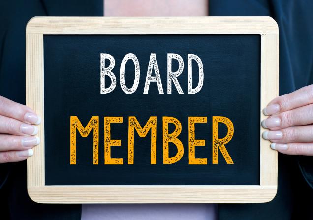 Small blackboard that reads Board Member. Image by docstockmedia via Shutterstock