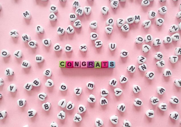 Congrats spelt out in little letter cubes. Image by Djordje Vezilic via Pexels
