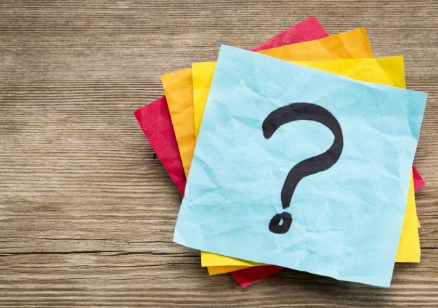 Question mark on a post-it note. Image by marekuliasz via Shutterstock.