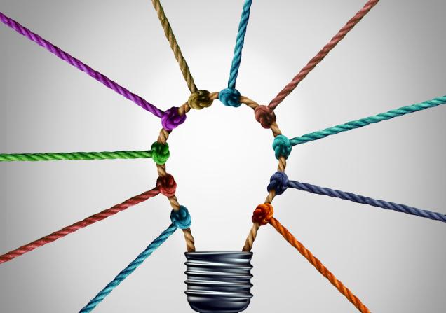 Coloured ropes are knotted to create a lightbulb shape. Image by Lightspring via Shutterstock.
