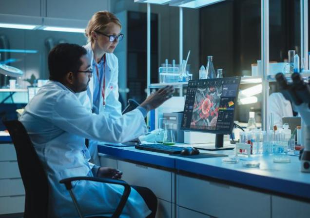 Researchers in lab working on vaccine development. Image credit: Gorodenkoff via Shutterstock