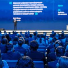 Back view of a crowd at an event. Image by Anton Gvozdikov via Shutterstock.