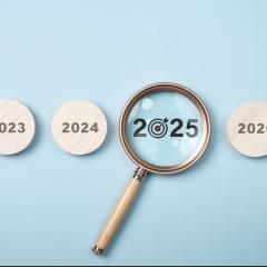 Magnifying glass on the letters 2025. 