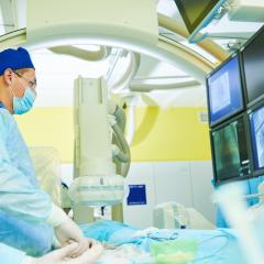 A interventional radiologist at work. Image by Dmitry Kalinovsky via Shutterstock.