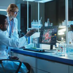 Researchers in lab working on vaccine development. Image credit: Gorodenkoff via Shutterstock
