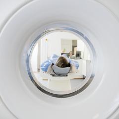 A woman undergoing a CT (computed tomography) scan. Image by Tyler Olson via Shutterstock.