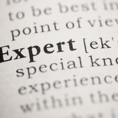 The word Expert in a dictionary. Image by Feng Yu via Shutterstock