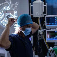 Hospital health workers preps for surgery. Image by wavebreakmedia via Shutterstock