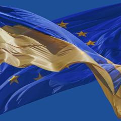 The flags of Ukraine and the EU. Image by Roman Malanchuk via Shutterstock